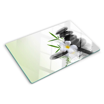 Szklana deska kuchenna z motywem kwiatów i kamieni na wodzie