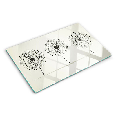 Deska kuchenna szklana z motywem dmuchawców na białym tle