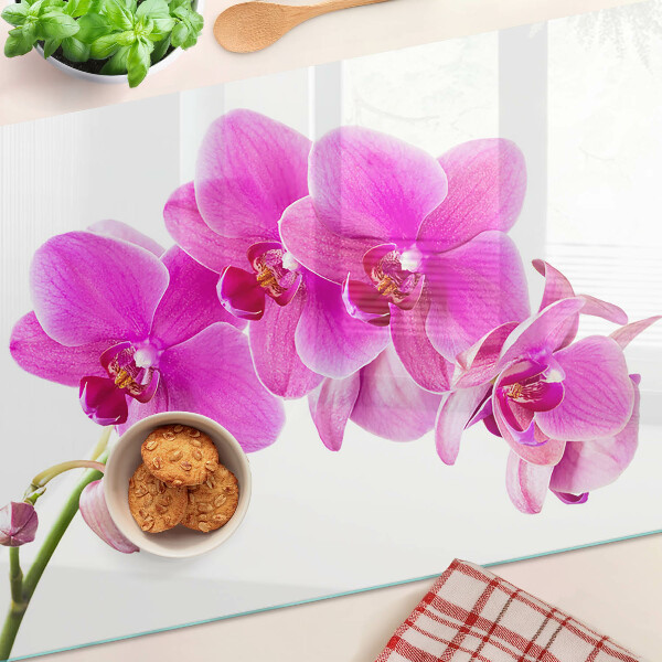 Szklana deska do krojenia z motywem orchidei w odcieniach różu