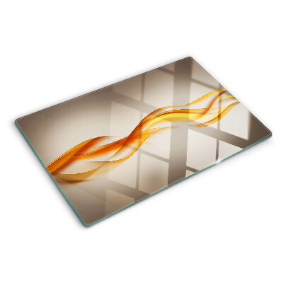 Szklana deska kuchenna z motywem fal w odcieniach złota