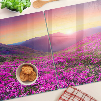 Szklana deska do krojenia z motywem kwiatowego krajobrazu o zachodzie słońca