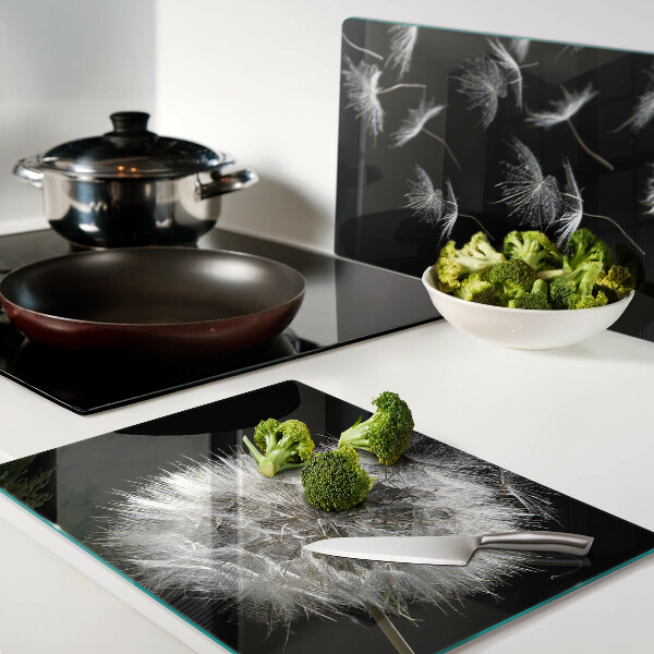 Deska kuchenna szklana z motywem dmuchawców na czarnym tle