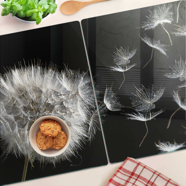 Deska kuchenna szklana z motywem dmuchawców na czarnym tle