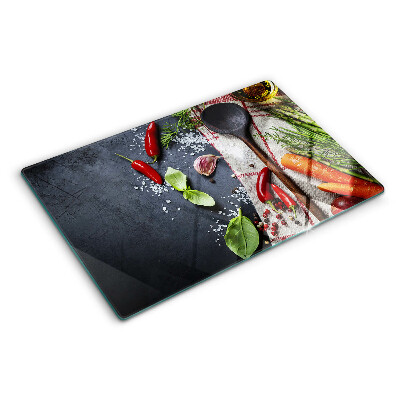 Szklana deska kuchenna z dekoracją przedstawiającą kuchenne przyprawy i warzywa