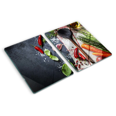 Szklana deska kuchenna z dekoracją przedstawiającą kuchenne przyprawy i warzywa