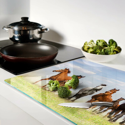 Szklana deska do krojenia z motywem galopujących koni na łące