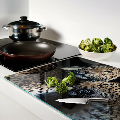 Szklana deska kuchenna z motywem gepardów na ciemnym tle
