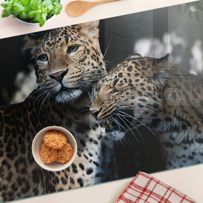 Szklana deska kuchenna z motywem gepardów na ciemnym tle