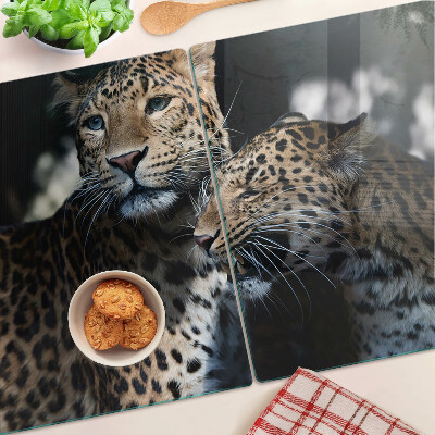 Szklana deska kuchenna z motywem gepardów na ciemnym tle