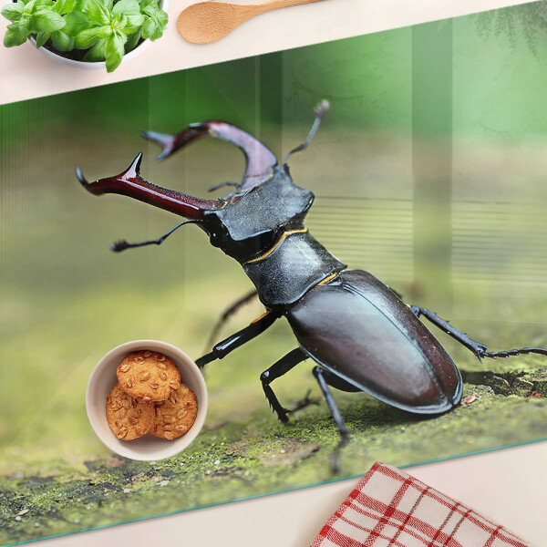 Deska kuchenna szklana z nadrukiem jelenia rogacza na zielonym tle