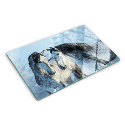 Szklana deska kuchenna z motywem koni w zimowym krajobrazie
