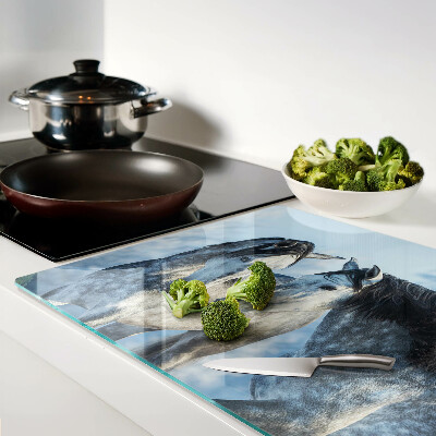 Szklana deska kuchenna z motywem koni w zimowym krajobrazie