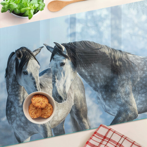 Szklana deska kuchenna z motywem koni w zimowym krajobrazie