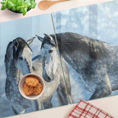 Szklana deska kuchenna z motywem koni w zimowym krajobrazie