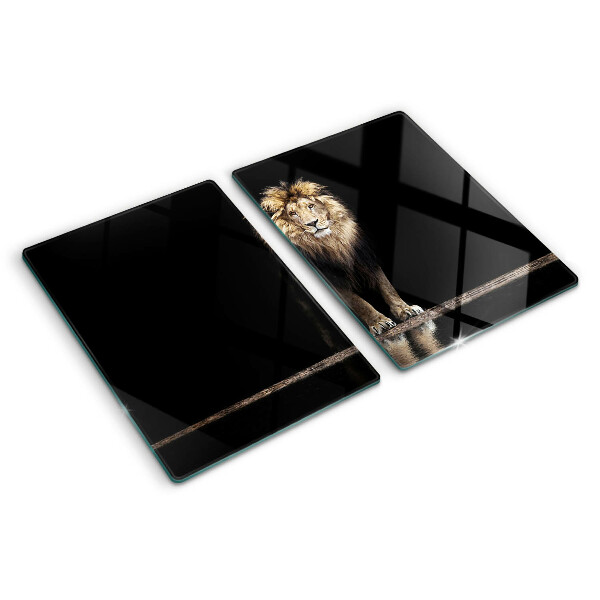 Szklana deska kuchenna z motywem lwa na ciemnym tle