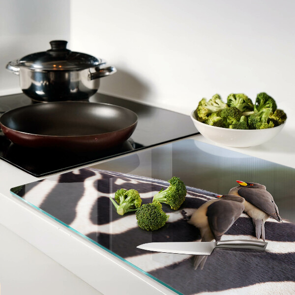 Szklana deska kuchenna z motywem ptaków na tle zebry