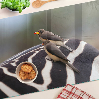 Szklana deska kuchenna z motywem ptaków na tle zebry