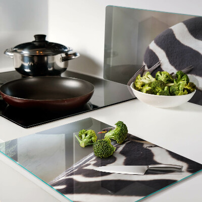 Szklana deska kuchenna z motywem ptaków na tle zebry