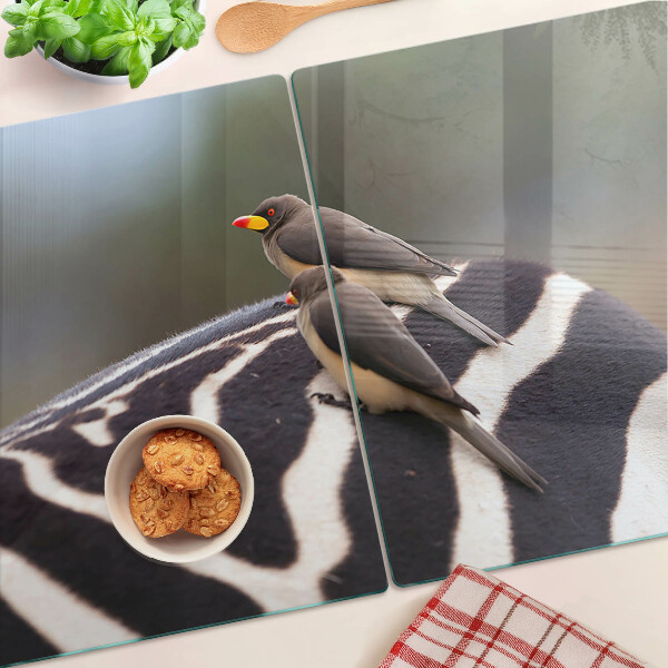 Szklana deska kuchenna z motywem ptaków na tle zebry