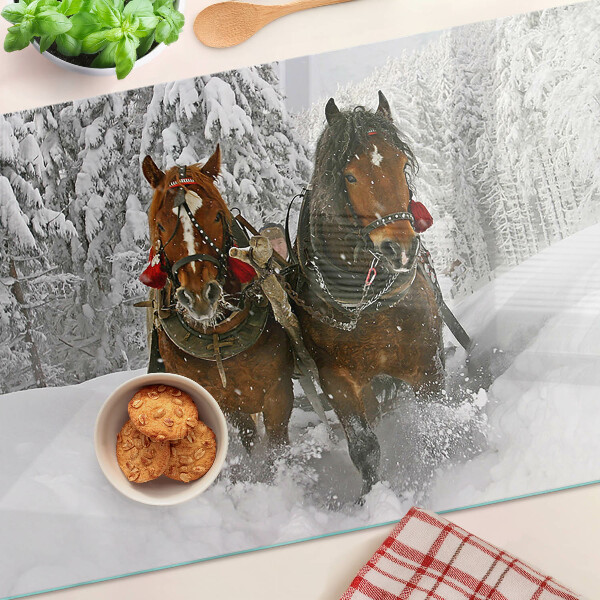 Szklana deska kuchenna z motywem koni pociągowych w śniegu