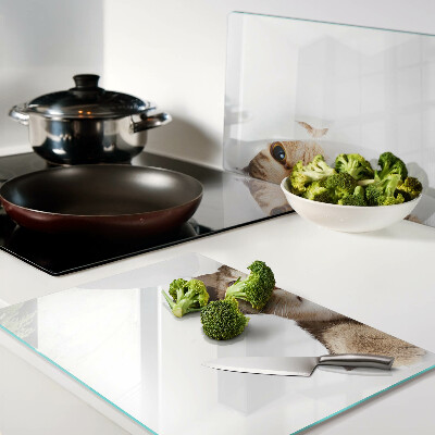 Deska kuchenna szklana z nadrukiem przedstawiającym kota patrzącego przez dziurę w ścianie