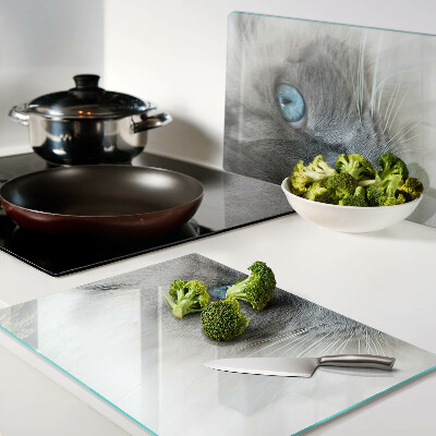 Szklana deska kuchenna z motywem kota z niebieskimi oczami