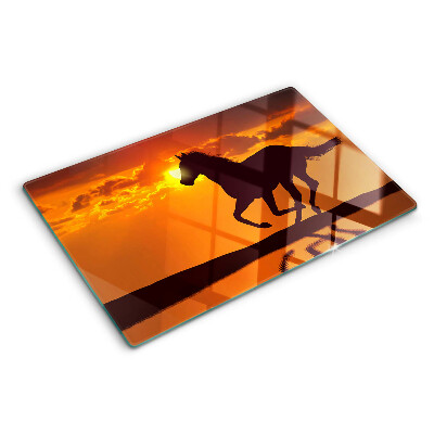 Szklana deska do krojenia z nadrukiem konia na tle zachodzącego słońca