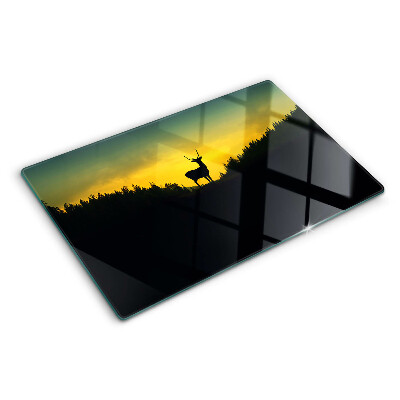 Szklana deska kuchenna z motywem jelenia na tle zachodzącego słońca