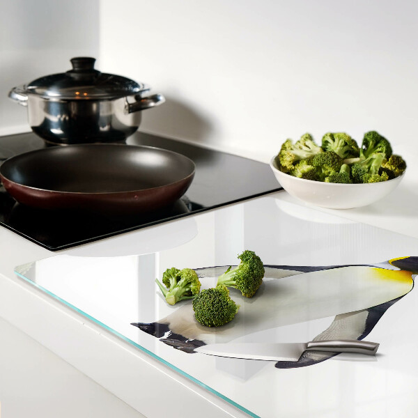 Szklana deska do krojenia z nadrukiem pingwina stojącego na lodzie