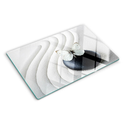 Deska kuchenna szklana z motywem motyla na tle kamienia