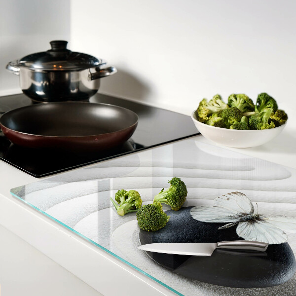 Deska kuchenna szklana z motywem motyla na tle kamienia