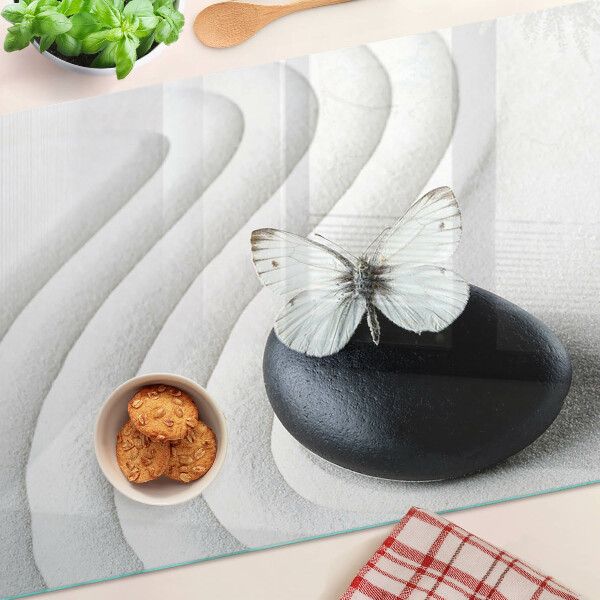 Deska kuchenna szklana z motywem motyla na tle kamienia