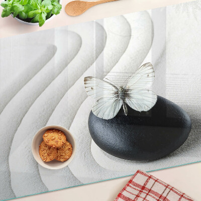 Deska kuchenna szklana z motywem motyla na tle kamienia