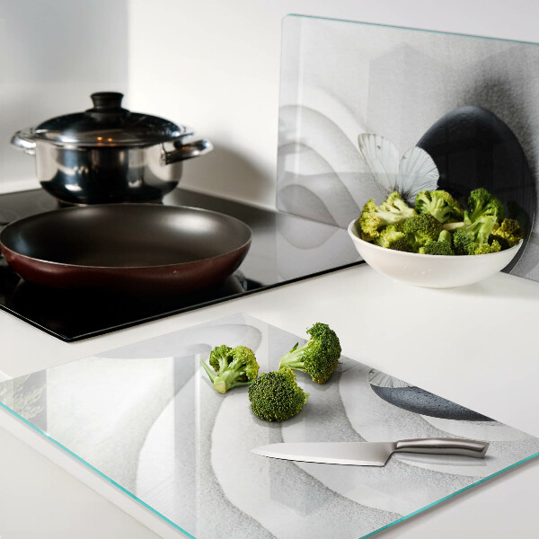 Deska kuchenna szklana z motywem motyla na tle kamienia