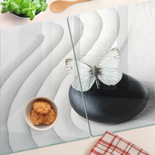 Deska kuchenna szklana z motywem motyla na tle kamienia