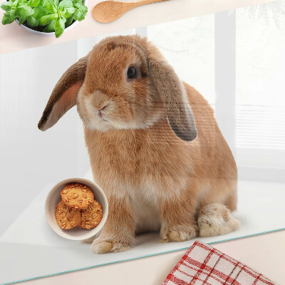 Szklana deska kuchenna z motywem królika na białym tle