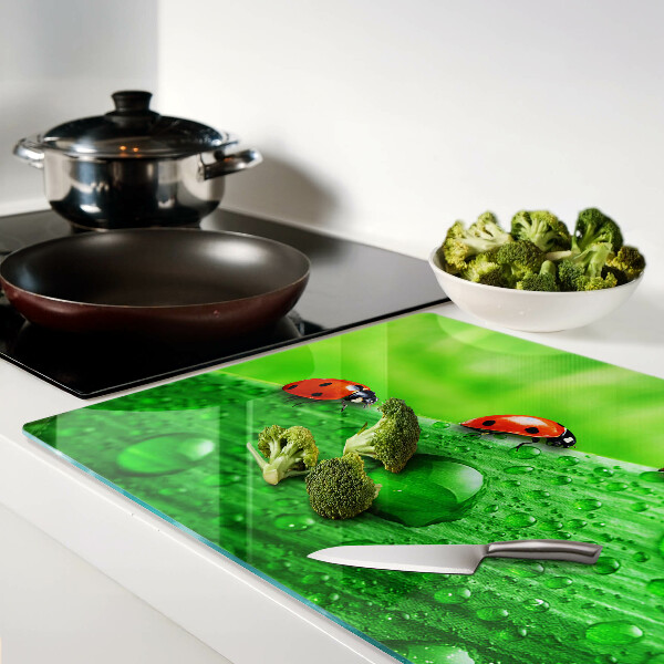 Deska kuchenna szklana z motywem biedronek na zielonym tle
