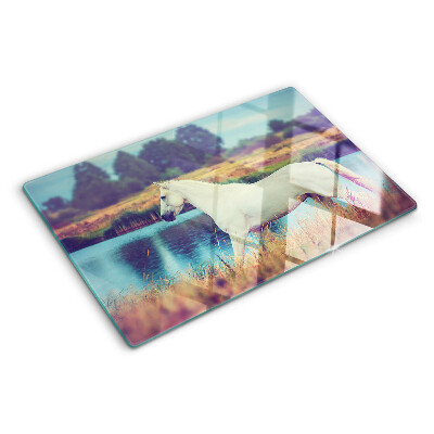 Szklana deska kuchenna z nadrukiem przedstawiającym biały koń nad wodą