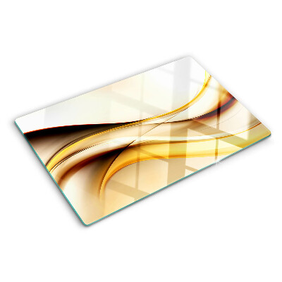 Deska kuchenna szklana z motywem abstrakcyjnych fal w odcieniach złota