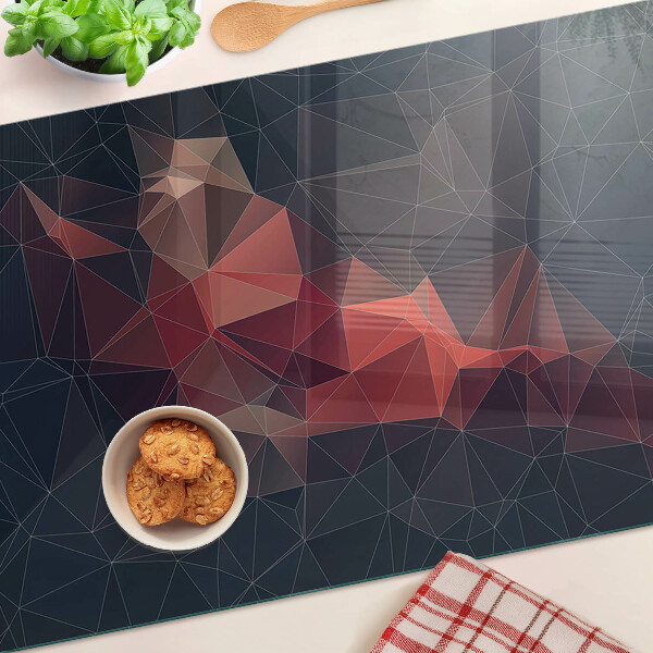 Deska kuchenna szklana z abstrakcyjnym wzorem geometrycznym w odcieniach czerwieni