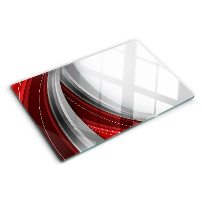 Szklana deska kuchenna z motywem abstrakcyjnych fal w odcieniach czerwieni i szarości