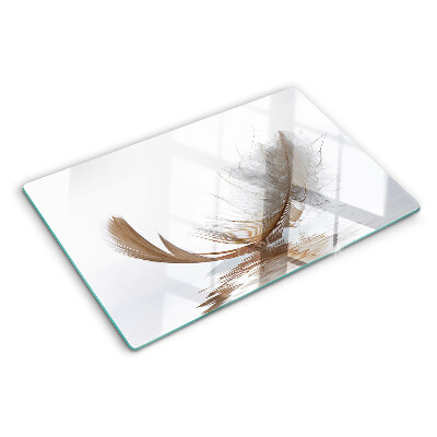 Deska kuchenna szklana z motywem pióra na tle wody