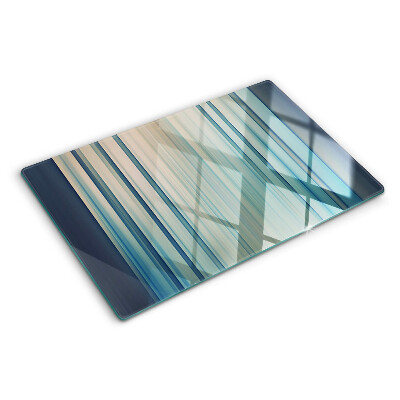 Szklana deska kuchenna z motywem abstrakcyjnych linii w odcieniach niebieskiego