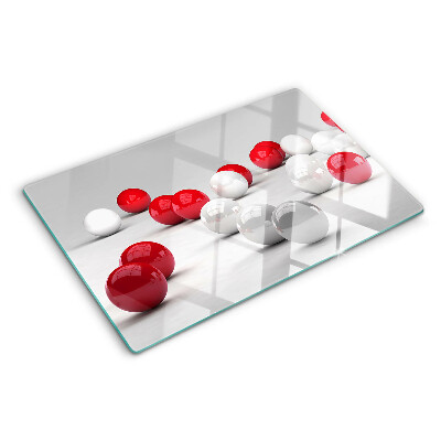 Szklana deska do krojenia z motywem czerwonych i białych kul