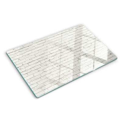 Szklana deska do krojenia z nadrukiem ceglanej ściany w białym kolorze