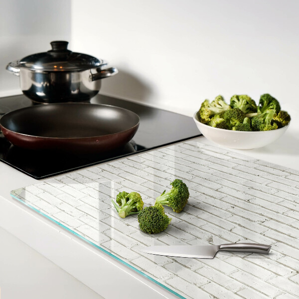 Szklana deska do krojenia z nadrukiem ceglanej ściany w białym kolorze