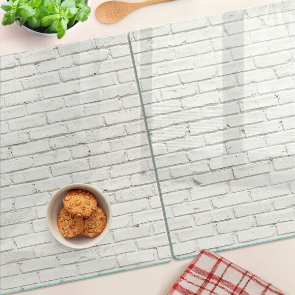 Szklana deska do krojenia z nadrukiem ceglanej ściany w białym kolorze