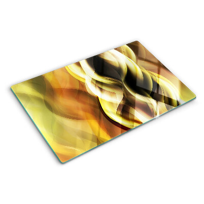 Szklana deska do krojenia z motywem abstrakcyjnych fal w odcieniach złota