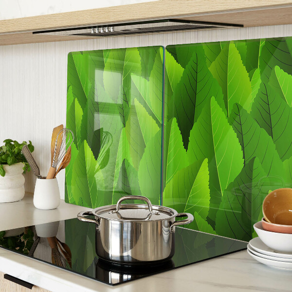 Szklana deska do krojenia z motywem liści w odcieniach zieleni