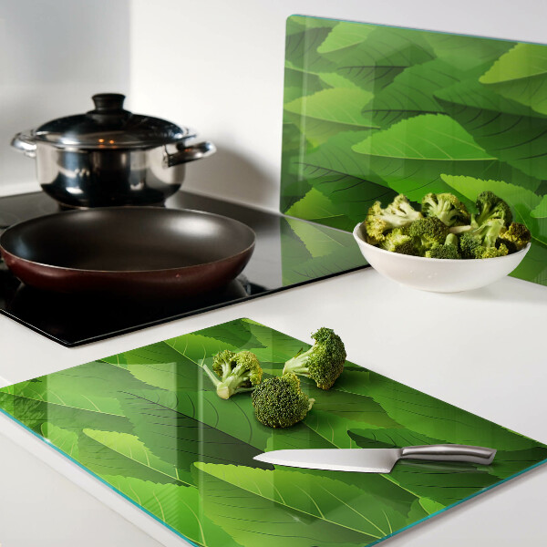 Szklana deska do krojenia z motywem liści w odcieniach zieleni